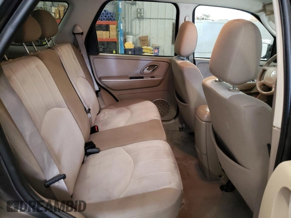 2006 Mercury Mariner Convenience with VIN 4M2YU56Z96KJ14418, listed as a Copart auction lot 47179135 with 163,557 mi miles and Salvage title. Bid and sale history available at DreamBid. Image 11.