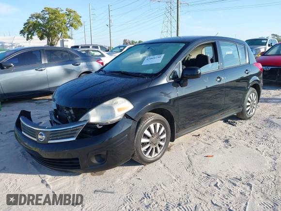 2009 Nissan Versa 1.8 SL with VIN 3N1BC13E79L476570, listed as a IAAI auction lot 41804750 with 160,449 mi miles. Bid and sale history available at carsss.com. Image 2.