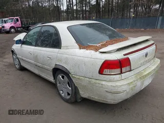 2001 Cadillac Catera z VIN W06VR54R31R002275, wystawiony jako IAAI lot #41328461 z przebiegiem 140 400 mil mil oraz . Historia ofert i sprzedaży dostępna na DreamBid. Obrazek 3.