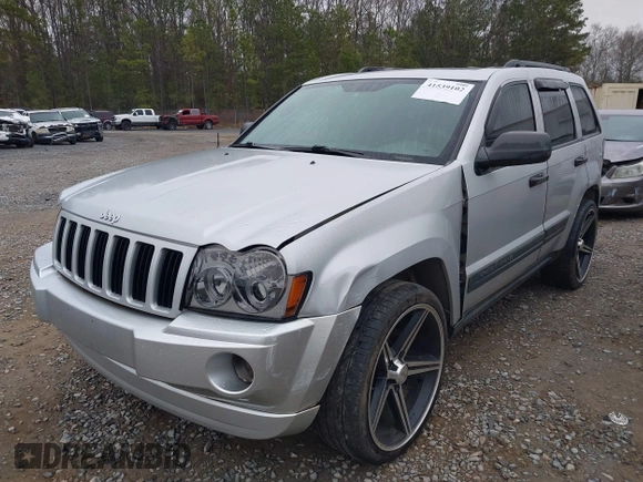 2005 Jeep Grand Cherokee Laredo z VIN 1J4GR48K05C506865, wystawiony jako IAAI lot #41539102 z przebiegiem 237 208 mil mil oraz . Historia ofert i sprzedaży dostępna na DreamBid. Obrazek 2.