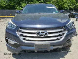 2017 Hyundai Santa Fe 2.4L z VIN 5NMZUDLB7HH028678, wystawiony jako Copart lot #57557855 z przebiegiem 102 049 mil mil oraz Szkoda całkowita • Salvage title. Historia ofert i sprzedaży dostępna na DreamBid. Obrazek 5.