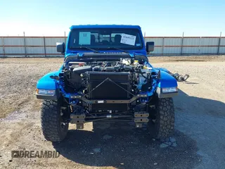 2024 Jeep Gladiator Willys z VIN 1C6HJTAG0RL123040, wystawiony jako IAAI lot #41849222 z przebiegiem 14 989 mil mil oraz . Historia ofert i sprzedaży dostępna na DreamBid. Obrazek 13.