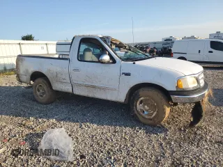 2000 Ford F-150 XL with VIN 1FTZF1727YKB49797, listed as a Copart auction lot 62154595 with Not provided miles and Salvage title. Bid and sale history available at DreamBid. Image 4.