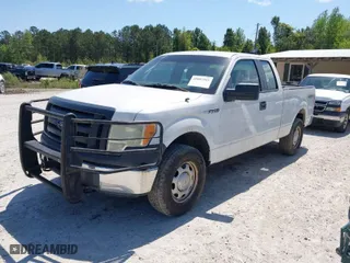 2011 Ford F-150 XL with VIN 1FTEX1EM3BFB85504, listed as a IAAI auction lot 42007203 with 317,085 mi miles. Bid and sale history available at carsss.com. Image 2.