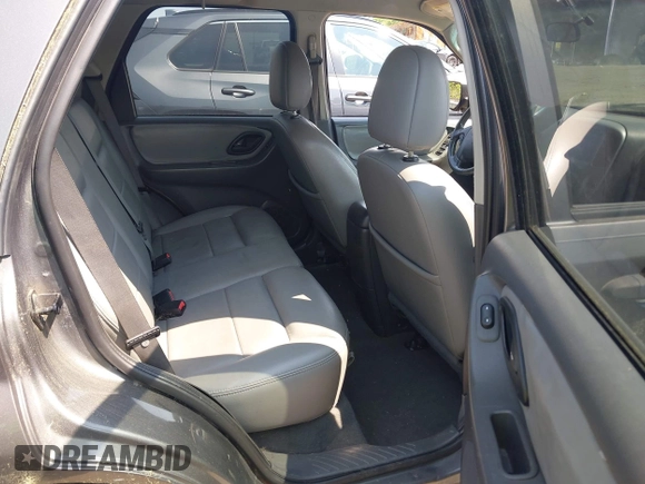2005 Ford Escape XLT with VIN 1FMYU93155KA87661, listed as a IAAI auction lot 42491447 with 142,287 mi miles and . Bid and sale history available at DreamBid. Image 8.