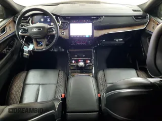 2023 Jeep Grand Cherokee Summit Reserve with VIN 1C4RJKEG3P8862582, listed as a Copart auction lot 54504345 with 9,763 mi miles and Salvage title. Bid and sale history available at DreamBid. Image 8.