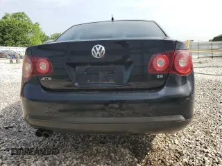 2009 Volkswagen Jetta S z VIN 3VWJM71K39M165677, wystawiony jako Copart lot #56901665 z przebiegiem 202 632 mil mil oraz Czysty tytuł • Clean title. Historia ofert i sprzedaży dostępna na DreamBid. Obrazek 6.