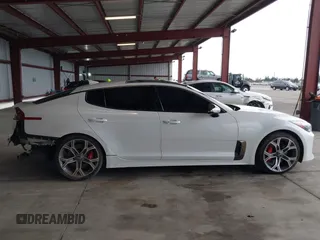 2019 Kia Stinger GT1 with VIN KNAE45LC4K6045047, listed as a IAAI auction lot 41489423 with 75,845 mi miles and . Bid and sale history available at DreamBid. Image 14.