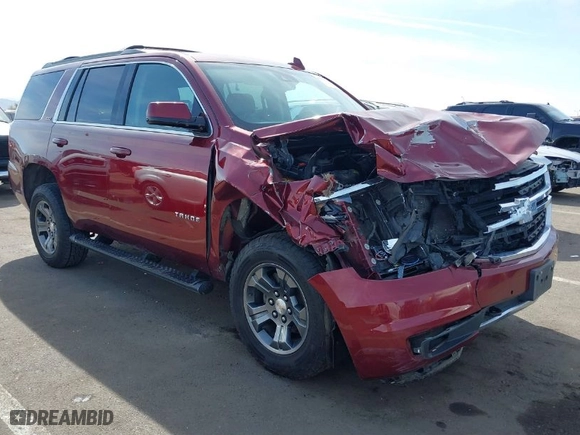2018 Chevrolet Tahoe LT with VIN 1GNSKBKC0JR213007, listed as a IAAI auction lot 41613263 with 137,537 mi miles. Bid and sale history available at carsss.com. Image 1.