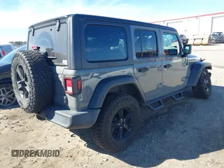 2021 Jeep Wrangler Unlimited Willys with VIN 1C4HJXDM6MW587152, listed as a IAAI auction lot 41687729 with 59,730 mi miles and . Bid and sale history available at DreamBid. Image 4.