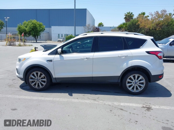 2018 Ford Escape Titanium with VIN 1FMCU0J94JUB26110, listed as a IAAI auction lot 42436285 with 59,586 mi miles and . Bid and sale history available at DreamBid. Image 14.