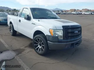 2014 Ford F-150 XL with VIN 1FTMF1CM3EKG36797, listed as a IAAI auction lot 40892574 with 136,417 mi miles. Bid and sale history available at carsss.com. Image 1.