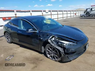 2019 Tesla Model 3 Mid Range with VIN 5YJ3E1EA3KF304286, listed as a IAAI auction lot 42066908 with 164,667 mi miles. Bid and sale history available at carsss.com. Image 1.