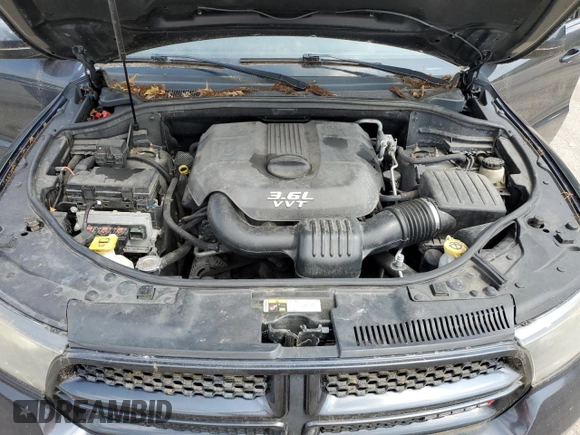2013 Dodge Durango SXT with VIN 1C4RDJAG2DC679979, listed as a Copart auction lot 64377695 with 209,671 mi miles and Clean title. Bid and sale history available at DreamBid. Image 12.