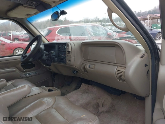 1997 Chevrolet Tahoe with VIN 1GNEK13R4VJ361515, listed as a IAAI auction lot 41768386 with 216,974 mi miles. Bid and sale history available at carsss.com. Image 5.