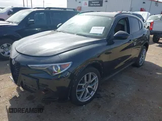 2018 Alfa Romeo Stelvio Sport z VIN ZASFAKPN0J7B71013, wystawiony jako IAAI lot #41938050 z przebiegiem Nie podano mil oraz . Historia ofert i sprzedaży dostępna na DreamBid. Obrazek 17.
