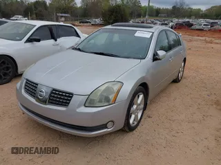 2004 Nissan Maxima SE z VIN 1N4BA41E74C869440, wystawiony jako IAAI lot #41886525 z przebiegiem 130 327 mil mil oraz . Historia ofert i sprzedaży dostępna na DreamBid. Obrazek 2.