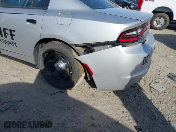 2021 Dodge Charger Police with VIN 2C3CDXAT8MH643477, listed as a IAAI auction lot 40688118 with 59,555 mi miles and . Bid and sale history available at DreamBid. Image 6.