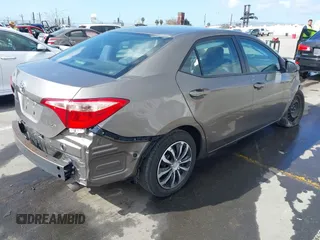 2019 Toyota Corolla L with VIN 5YFBURHE8KP892394, listed as a IAAI auction lot 41917095 with 89,073 mi miles. Bid and sale history available at carsss.com. Image 4.