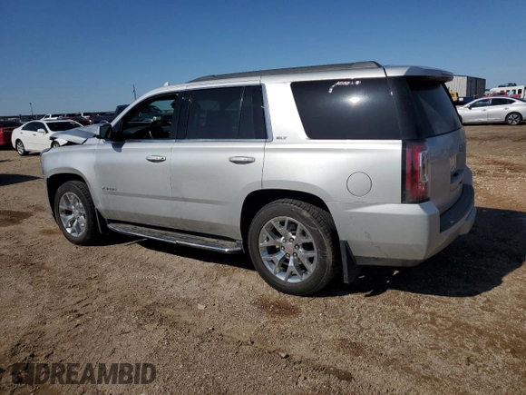 2017 GMC Yukon SLT with VIN 1GKS2BKC9HR345688, listed as a Copart auction lot 52303075 with 122,969 mi miles and Salvage Title. Bid and sale history available at carsss.com. Image 2.