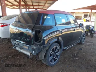 2014 MINI Countryman S with VIN WMWZC5C57EWP39919, listed as a IAAI auction lot 41613909 with 139,138 mi miles and . Bid and sale history available at DreamBid. Image 4.