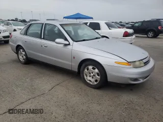 2002 Saturn LS z VIN 1G8JW54R32Y517171, wystawiony jako Copart lot #74849884 z przebiegiem Nie podano mil oraz Szkody całkowita. Historia ofert i sprzedaży dostępna na DreamBid. Obrazek 4.
