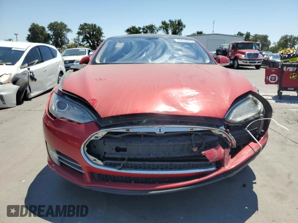 2014 Tesla Model S 60 with VIN 5YJSA1H1XEFP31861, listed as a Copart auction lot 65275815 with Not provided miles and Clean title. Bid and sale history available at DreamBid. Image 5.