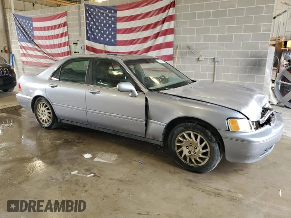 1998 Acura RL Premium with VIN JH4KA965XWC012742, listed as a Copart auction lot 73298574 with 0 mi miles and Salvage Title. Bid and sale history available at carsss.com. Image 4.