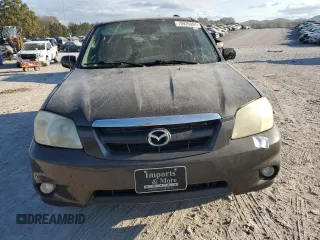 2006 Mazda Tribute S with VIN 4F2YZ04116KM23873, listed as a Copart auction lot 79926084 with 67,142 mi miles and Salvage Title. Bid and sale history available at DreamBid. Image 5.