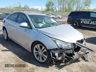 2011 Chevrolet Cruze LTZ z VIN 1G1PH5S9XB7141998, wystawiony jako IAAI lot #42160299 z przebiegiem Nie podano mil oraz . Historia ofert i sprzedaży dostępna na DreamBid. Obrazek 1.
