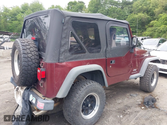 2004 Jeep Wrangler SE with VIN 1J4FA291X4P720783, listed as a IAAI auction lot 42446334 with 69,672 mi miles and . Bid and sale history available at DreamBid. Image 4.