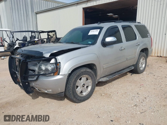 2011 Chevrolet Tahoe LT with VIN 1GNSCBE08BR369781, listed as a IAAI auction lot 42207208 with 162,038 mi miles and . Bid and sale history available at DreamBid. Image 2.