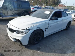 2014 BMW 4 Series 428i with VIN WBA3N3C5XEF710869, listed as a IAAI auction lot 40984116 with 115,958 mi miles and . Bid and sale history available at DreamBid. Image 2.