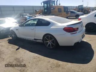 2016 BMW M6 z VIN WBS6J9C56GD934498, wystawiony jako Copart lot #73539754 z przebiegiem 116 944 mil mil oraz Czysty tytuł • Clean title. Historia ofert i sprzedaży dostępna na DreamBid. Obrazek 2.