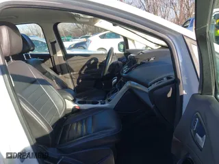 2016 Ford C-Max Energi SEL with VIN 1FADP5CU2GL118381, listed as a IAAI auction lot 41516426 with 220,361 mi miles. Bid and sale history available at carsss.com. Image 5.