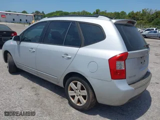 2007 Kia Rondo LX with VIN KNAFG525777087180, listed as a IAAI auction lot 42094657 with 125,256 mi miles. Bid and sale history available at carsss.com. Image 3.