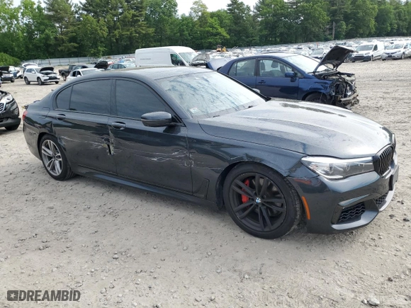 2019 BMW 7 Series 740i xDrive with VIN WBA7E4C53KGV28721, listed as a Copart auction lot 57747054 with 60,671 mi miles and Salvage Title. Bid and sale history available at carsss.com. Image 4.