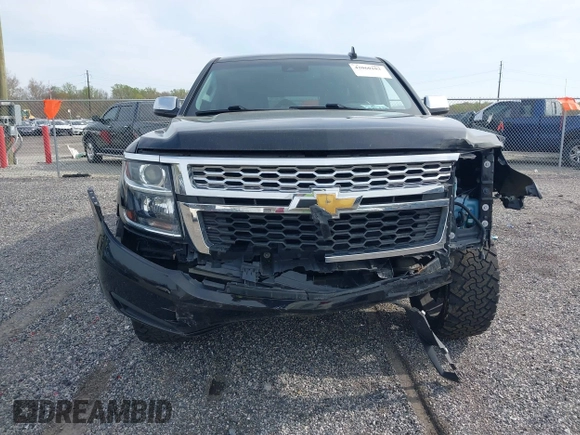 2019 Chevrolet Suburban LT with VIN 1GNSCHKC2KR408575, listed as a IAAI auction lot 42060103 with 144,838 mi miles and . Bid and sale history available at DreamBid. Image 12.