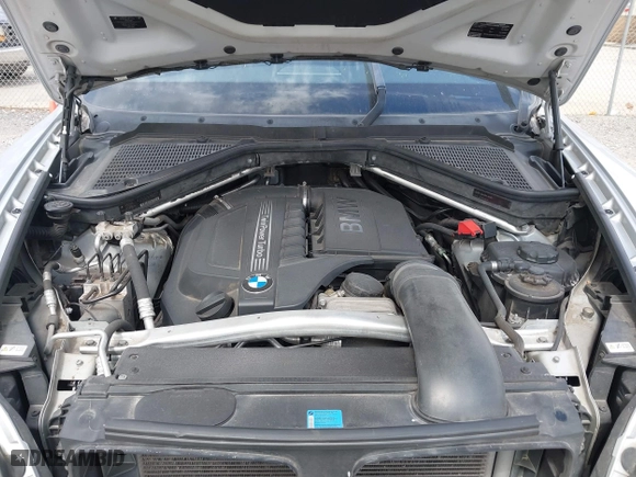 2011 BMW X5 35i with VIN 5UXZV4C52BL742911, listed as a IAAI auction lot 41845588 with 123,001 mi miles. Bid and sale history available at carsss.com. Image 10.