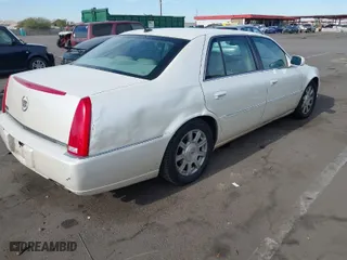 2008 Cadillac DTS w/1SD with VIN 1G6KD57Y98U184304, listed as a IAAI auction lot 41205430 with 177,698 mi miles. Bid and sale history available at carsss.com. Image 4.