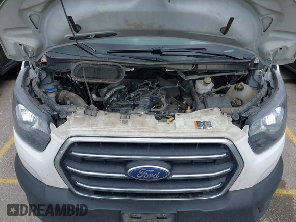 2020 Ford Transit Cargo with VIN 1FTYE1YG8LKB08273, listed as a IAAI auction lot 42306747 with 181,121 mi miles and . Bid and sale history available at DreamBid. Image 10.