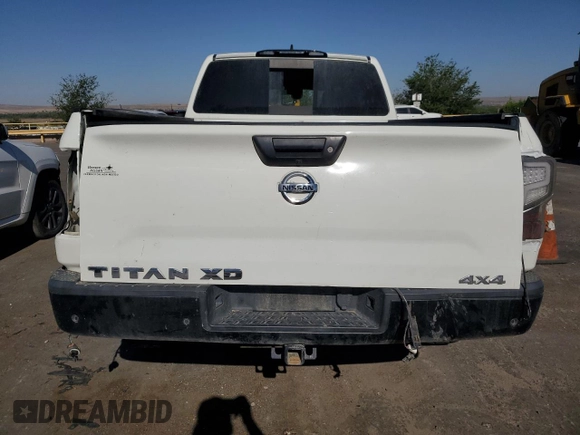 2022 Nissan Titan SV z VIN 1N6AA1FA8NN106193, wystawiony jako Copart lot #56479285 z przebiegiem 27 443 mil mil oraz Szkoda całkowita • Salvage title. Historia ofert i sprzedaży dostępna na DreamBid. Obrazek 6.