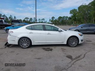 2015 Kia Cadenza Premium with VIN KNALN4D79F5178379, listed as a IAAI auction lot 41594983 with 56,205 mi miles. Bid and sale history available at carsss.com. Image 13.