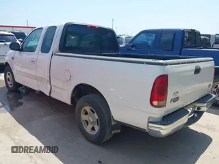 2003 Ford F-150 XL with VIN 1FTRX17243KA96403, listed as a IAAI auction lot 42017173 with 195,120 mi miles. Bid and sale history available at carsss.com. Image 3.