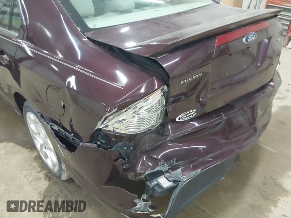2011 Ford Fusion SE with VIN 3FAHP0HAXBR308930, listed as a IAAI auction lot 42028352 with 116,116 mi miles. Bid and sale history available at carsss.com. Image 6.