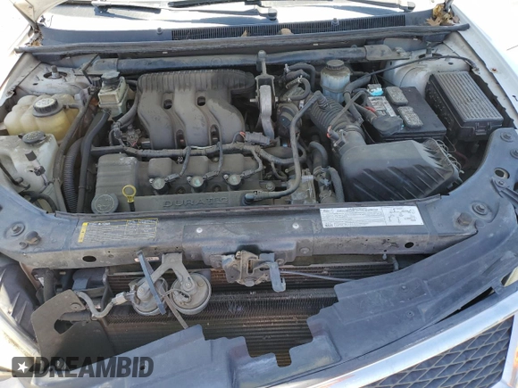 2005 Ford Five Hundred SE z VIN 1FAFP231X5G166052, wystawiony jako Copart lot #57831975 z przebiegiem 90 036 mil mil oraz Czysty tytuł • Clean title. Historia ofert i sprzedaży dostępna na DreamBid. Obrazek 11.