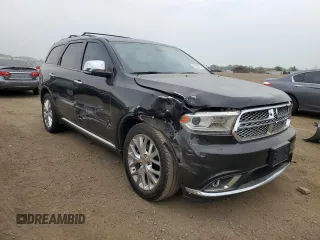 2015 Dodge Durango Citadel with VIN 1C4SDHET2FC771291, listed as a Copart auction lot 60902455 with 130,206 mi miles and Salvage title. Bid and sale history available at DreamBid. Image 4.