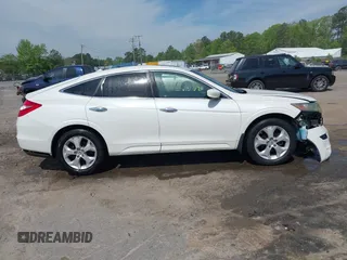 2010 Honda Crosstour EX-L z VIN 5J6TF2H55AL011092, wystawiony jako IAAI lot #42113820 z przebiegiem 239 179 mil mil oraz . Historia ofert i sprzedaży dostępna na DreamBid. Obrazek 13.