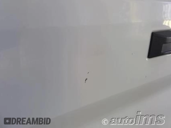 2020 Ford Transit Cargo with VIN 1FTBW3X82LKB36188, listed as a IAAI auction lot 42828633 with 71,589 mi miles and . Bid and sale history available at DreamBid. Image 2.