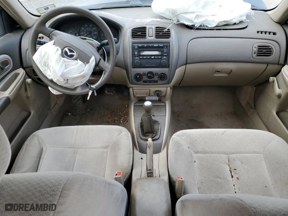 2001 Mazda Protege DX with VIN JM1BJ222510429507, listed as a Copart auction lot 78640074 with 145,735 mi miles and Salvage Title. Bid and sale history available at carsss.com. Image 8.